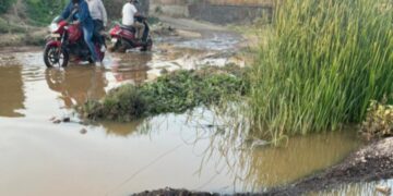 Residents protest AMC's inaction as builders block drainage